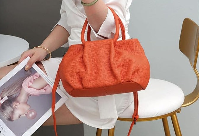 Trendy Pleated Leather Women's Handbag orangee on model